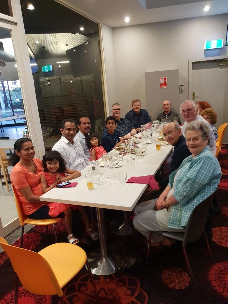 Knights and families gathered for a branch dinner