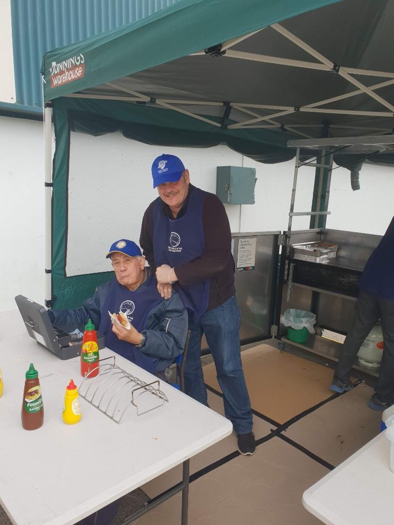 Knights volunteering at a Bunnings sausage sizzle fundraiser