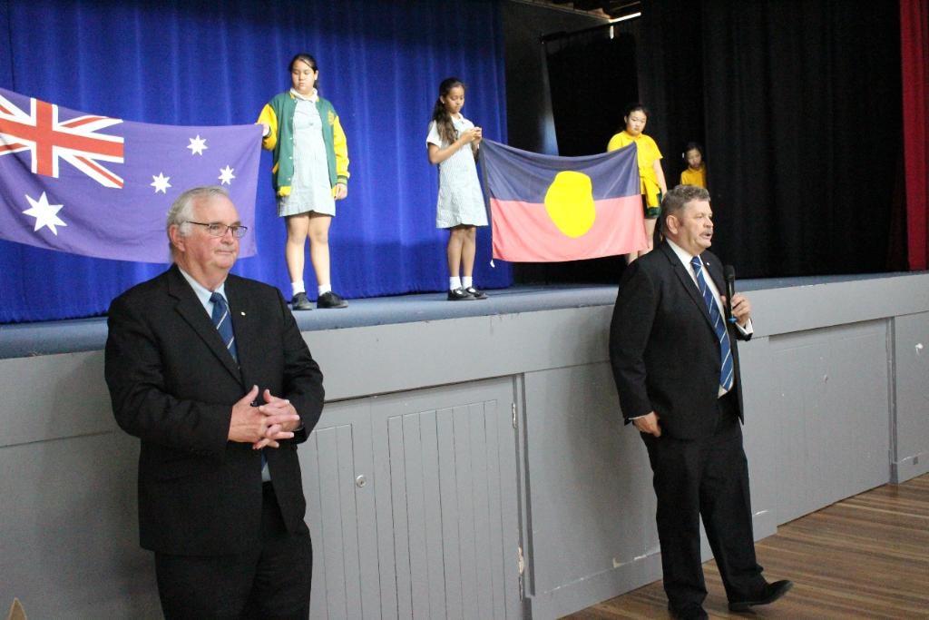 Knights members speaking at school community event